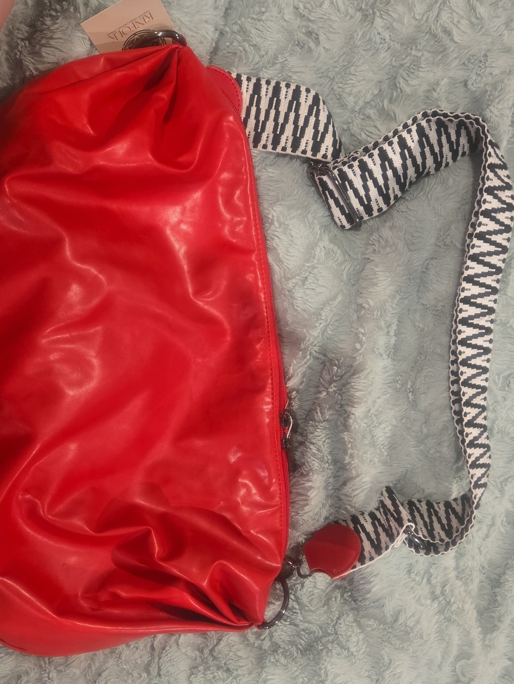 HAUTE SHORE Red Shoulder Sling Bag with Black-and-White Strap